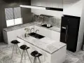 Moderna cocina blanca y gris claro con isla central, fregadero doble, taburetes negros y electrodomésticos de acero inoxidable.