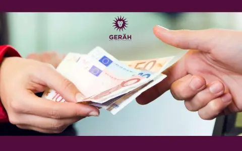 Manos intercambiando billetes de euro. Es obligatorio depositar la fianza en el IVIMA para formalizar el alquiler.