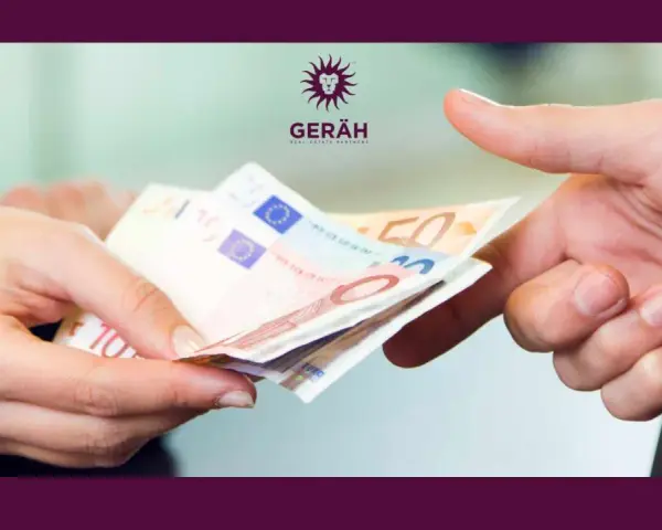 Manos intercambiando billetes de euro. Es obligatorio depositar la fianza en el IVIMA para formalizar el alquiler.