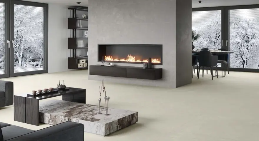 Elegante sala de estar con chimenea moderna y minimalista. La pared de la chimenea es ideal para decorar pared chimenea, con un diseño limpio y acogedor.