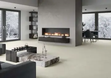 Elegante sala de estar con chimenea moderna y minimalista. La pared de la chimenea es ideal para decorar pared chimenea, con un diseño limpio y acogedor.
