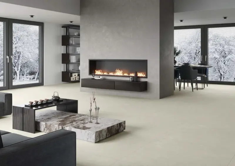 Elegante sala de estar con chimenea moderna y minimalista. La pared de la chimenea es ideal para decorar pared chimenea, con un diseño limpio y acogedor.